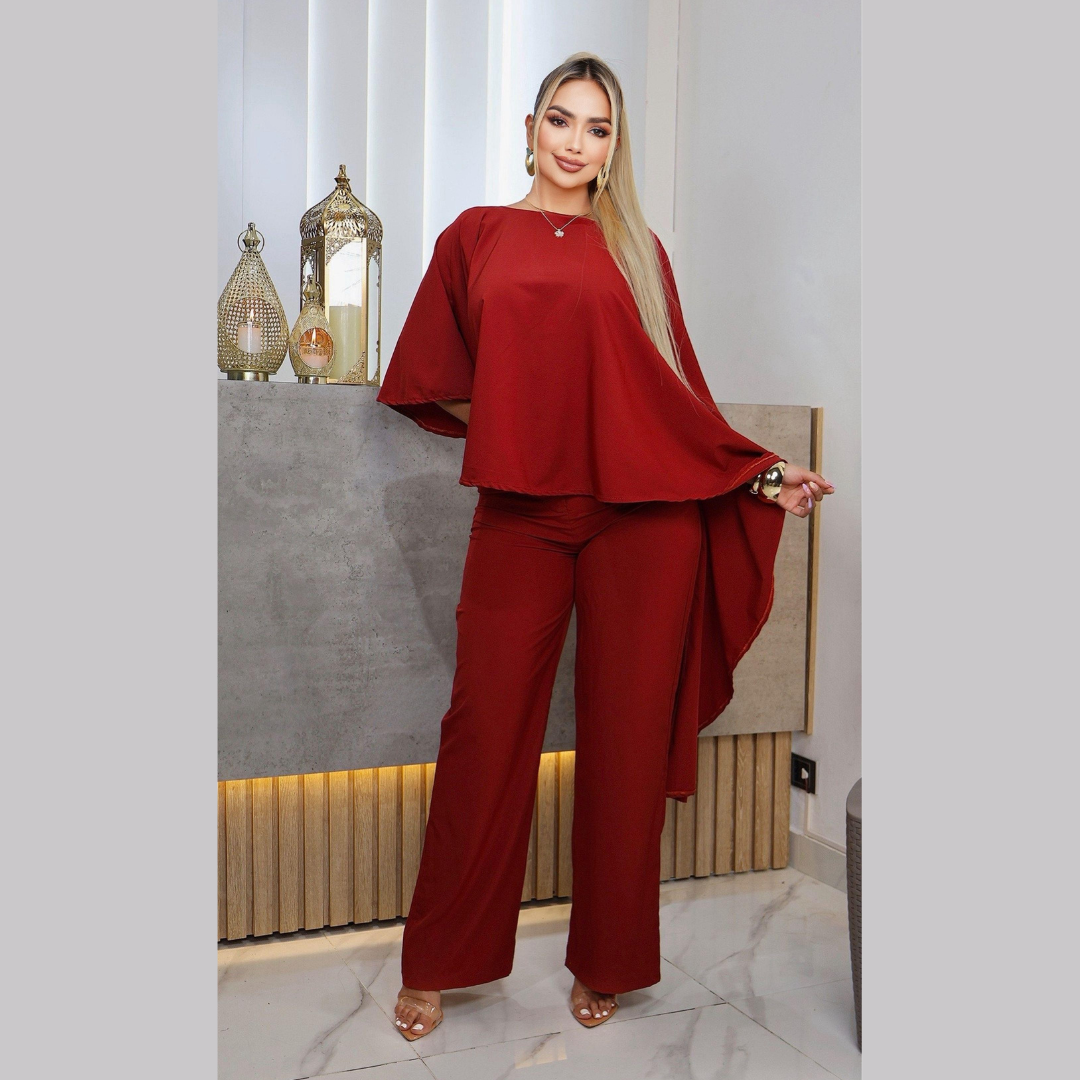 Conjunto elegante con blusa asimétrica y pantalón ancho