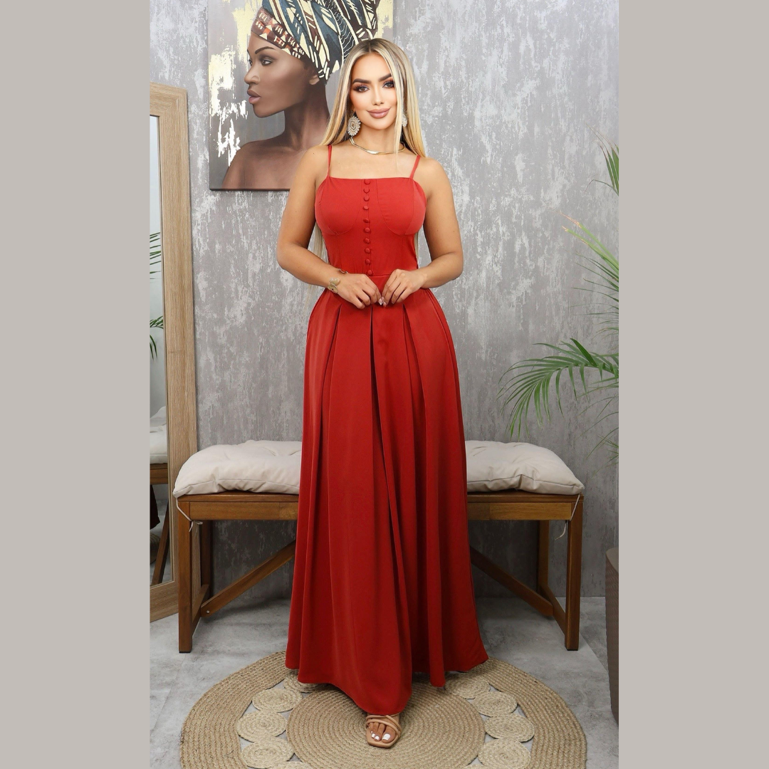 Vestido de gala con tirantes finos y falda plisada en corte amplio