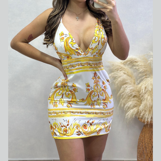 Vestido corto estampado  Escote profundo y tiras delgadas