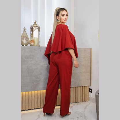 Conjunto elegante con blusa asimétrica y pantalón ancho