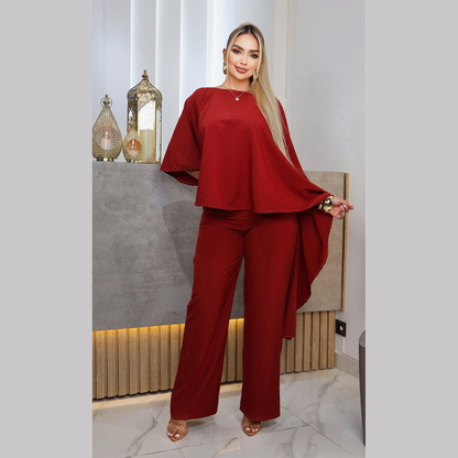 Conjunto elegante con blusa asimétrica y pantalón ancho